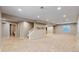 Spacious finished basement with neutral carpet and recessed lighting at 5640 S Marshall St, Denver, CO 80123