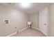 Basement laundry room with a utility sink at 5640 S Marshall St, Denver, CO 80123