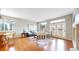 Stylish living room featuring hardwood floors, ample natural light, and comfortable seating for relaxation and entertaining at 5640 S Marshall St, Denver, CO 80123