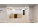 Basement wet bar featuring a mini fridge, sink, and ample counter space at 5640 S Marshall St, Denver, CO 80123