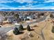 Residential neighborhood with mountain views, featuring well-maintained homes and landscaping at 14669 Eagle River Run, Broomfield, CO 80023