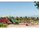 Modern playground with swingset, slide and climbing structure in a well-maintained community park at 14669 Eagle River Run, Broomfield, CO 80023
