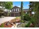 Inviting two-story home with a two-car garage and landscaped front yard at 7955 S Bemis St, Littleton, CO 80120