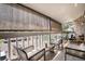 Balcony with seating and a view of the neighborhood at 8600 E Alameda Ave # 21-208, Denver, CO 80247