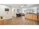 Bright kitchen and dining room combo with wood floors; great light and bright space for entertaining at 9625 E Center Ave # 5D, Denver, CO 80247