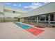 Recreation: Outdoor shuffleboard court available to residents near the clubhouse at 9625 E Center Ave # 5D, Denver, CO 80247