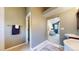 Hallway bathroom featuring a bathtub, glass-enclosed shower, and access to the main bedroom at 982 E 130Th Cir, Thornton, CO 80241