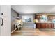 Open layout kitchen with an office nook provides a convenient workspace at 982 E 130Th Cir, Thornton, CO 80241