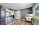 Convenient office nook is connected to the dining area and kitchen at 982 E 130Th Cir, Thornton, CO 80241