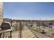 Balcony area with grill, great for outdoor relaxation and enjoying a pleasant view at 15475 Andrews Dr # 401, Denver, CO 80239