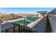 Community pool covered for protection and seasonal use, with lounge area and picnic tables at 3639 Recess Ln, Castle Rock, CO 80108