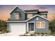 Charming two-story home with neutral siding, white trim, and a two-car garage at 3639 Recess Ln, Castle Rock, CO 80108