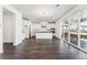 Open-concept kitchen and dining area with stainless steel appliances and sliding glass door to patio at 3639 Recess Ln, Castle Rock, CO 80108