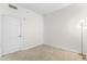 Bright bedroom with neutral walls and carpeting at 1975 N Grant St # 721, Denver, CO 80203