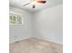 Clean bedroom with carpeted floor, a window to let in natural light, and ceiling fan at 602 Birch St, Broomfield, CO 80020