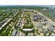 Aerial view of neighborhood with tree-lined streets, green spaces, and the home marked by a pin at 8189 E 29Th Ave, Denver, CO 80238