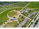 Bird's-eye view of a park with a playground, walking paths, landscaping and a parking lot at 8189 E 29Th Ave, Denver, CO 80238