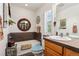 Bathroom featuring a shower-tub, toilet, and sink at 8189 E 29Th Ave, Denver, CO 80238