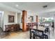 This common area includes high top tables and a kitchen with bar seating at 2225 Buchtel Blvd # 105, Denver, CO 80210
