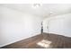 Bright bedroom with hardwood floors and a double door closet at 1654 Valentia St, Denver, CO 80220