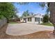 Wide backyard with large concrete patio, fence and building's exterior at 3925 Pecos St, Denver, CO 80211
