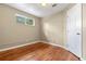 This room features hardwood floors, a window for natural light and a neutral color scheme at 3925 Pecos St, Denver, CO 80211