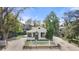 Charming home featuring a white picket fence and well-manicured landscaping at 3925 Pecos St, Denver, CO 80211