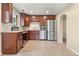Well-equipped kitchen with stainless steel appliances and dark wood cabinetry at 3925 Pecos St, Denver, CO 80211