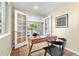 Stylish office featuring hardwood floors, neutral colors, and great natural light at 3925 Pecos St, Denver, CO 80211