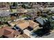 Aerial view of a single-Gathering home with a fenced backyard and mature trees at 2424 S Jasmine St, Denver, CO 80222