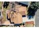 Overhead shot of the home's roof, driveway, and well-manicured lawn at 2424 S Jasmine St, Denver, CO 80222