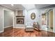 Bright living room with a cozy fireplace and skylight, offering a comfortable and inviting space at 2424 S Jasmine St, Denver, CO 80222
