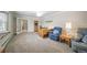 Neutral office featuring a ceiling fan, carpet, and space for a comfortable seating area at 2424 S Jasmine St, Denver, CO 80222