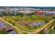 Aerial view of a wetland habitat in a suburban area showing proximity to local residences and green spaces at 476 S Saulsbury St, Lakewood, CO 80226