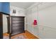 Organized walk-in closet with shelving and wooden floors at 476 S Saulsbury St, Lakewood, CO 80226