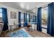 Bright dining area with large windows, comfortable seating, and stylish decor at 1150 Inca St # 25, Denver, CO 80204