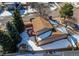 Aerial view of a house featuring a fenced yard with a deck at 5894 S Oak St, Littleton, CO 80127