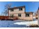The home features a multi-story back deck, ready for entertaining guests at 5894 S Oak St, Littleton, CO 80127