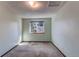 Inviting bedroom with a window, offering a relaxing space to unwind at 5894 S Oak St, Littleton, CO 80127