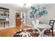 Bright office space features hardwood floors, custom shelving, and modern decor accents at 7398 E Windlawn Way, Parker, CO 80134