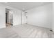 Spacious bedroom includes an en-suite bath and walk-in closet with plush carpeting throughout at 16975 W 92Nd Loop, Arvada, CO 80007