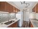 Functional kitchen featuring granite countertops, stainless steel appliances, and plenty of storage at 8424 Everett Way # A, Arvada, CO 80005