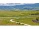 Walking path alongside open green space at 9807 Rosalee Peak St, Littleton, CO 80125