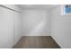 Clean, spacious basement room with carpet and double doors at 4620 W Alaska Pl, Denver, CO 80219