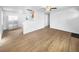 Open concept kitchen with stainless steel appliances and hardwood floors at 4620 W Alaska Pl, Denver, CO 80219