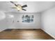 Bright and airy living room with hardwood floors and lots of natural light at 4620 W Alaska Pl, Denver, CO 80219