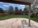 Enjoy this outdoor living space with a covered patio overlooking a spacious, fenced backyard at 8182 Sweet Water Rd, Lone Tree, CO 80124