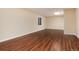Finished basement with hardwood flooring and a window for natural light at 8182 Sweet Water Rd, Lone Tree, CO 80124