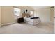 Spacious bedroom with neutral carpet, vaulted ceiling, sliding closet and large windows at 8182 Sweet Water Rd, Lone Tree, CO 80124