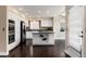 Modern kitchen with an island, stainless steel appliances, and sleek countertops at 8182 Sweet Water Rd, Lone Tree, CO 80124
